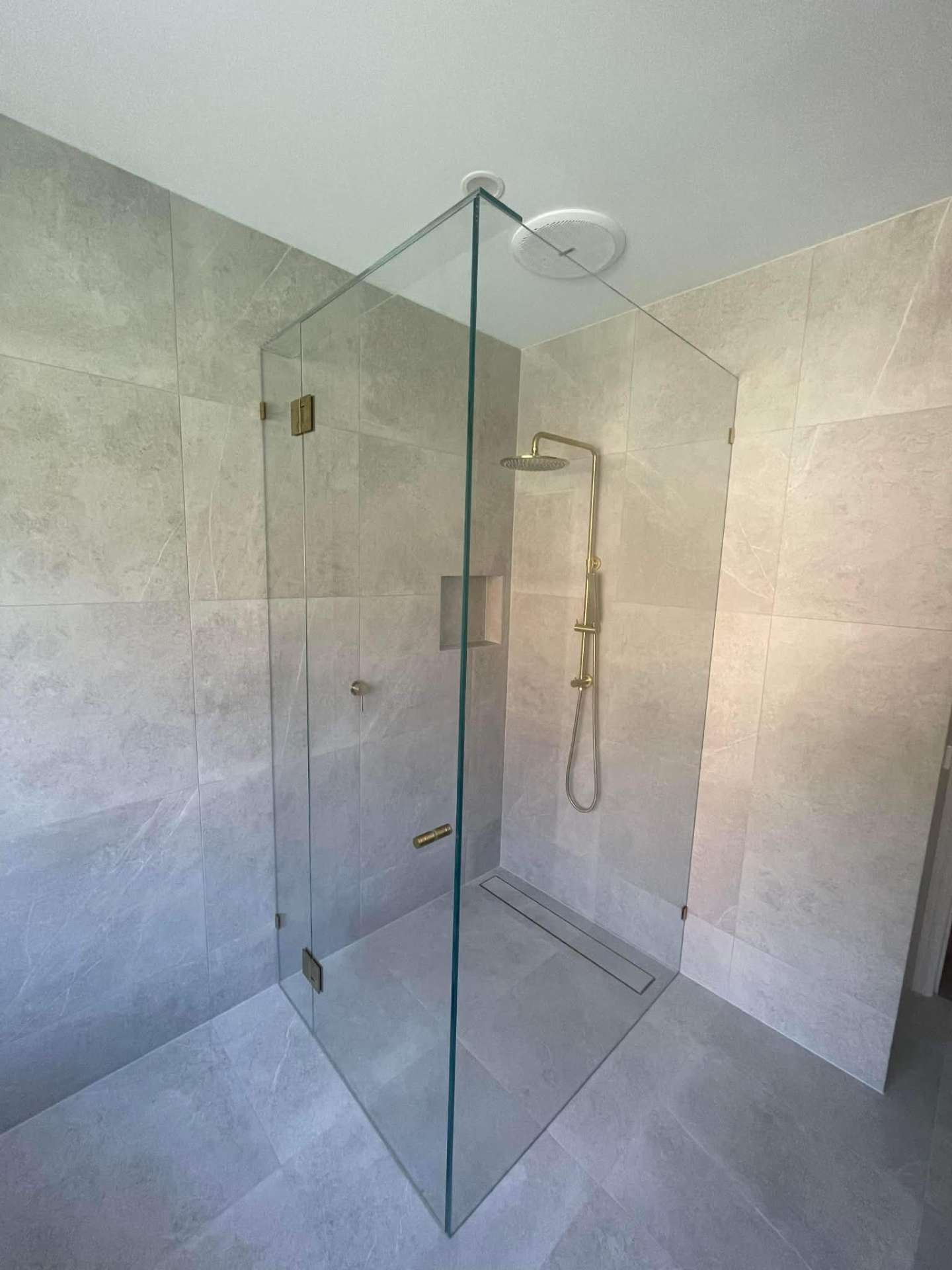 Walk in frameless glass shower installation